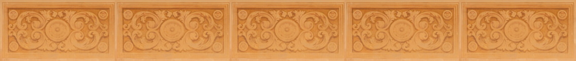 Elements of architectural decorations of buildings, gypsum stucco, wall texture, plaster molding and patterns. On the streets in Catalonia, public places. © Kozlik_mozlik