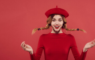 Woman with pigtails red dress hat cropped view isolated background