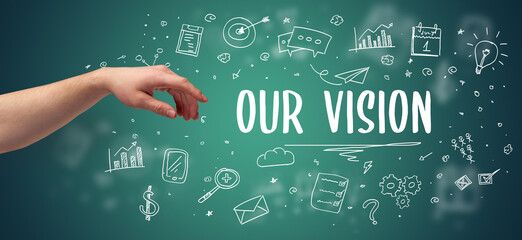Close-Up of cropped hand pointing at OUR VISION inscription, modern business solution concept