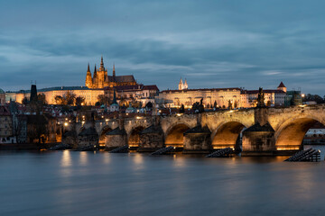 Fototapeta na wymiar Prague Castle and St. Vitus Cathedral and Charles Bridge on the Vltava River and on the banks