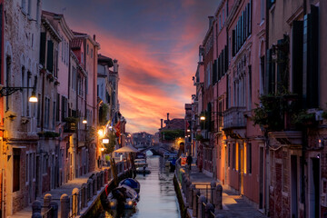 Fototapeta premium typical Venetian alley called calle at sunset without anyone because of the covid 19