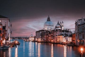 Obraz na płótnie Canvas view of the Canal Grand and Basilica of Santa Maria della Salute from the Accademia bridge during covid 19 at sunset 