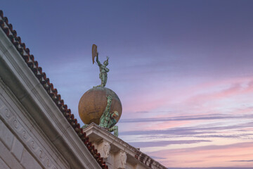 Basilica of Santa Maria della Salute in Venice seen at sunset with Occasio statue