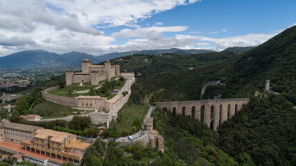 Fototapeta premium Ponte delle Torri and Rocca Albornoziana in Spoleto, aerial photography with drone, panorama of the city and typical medieval buildings