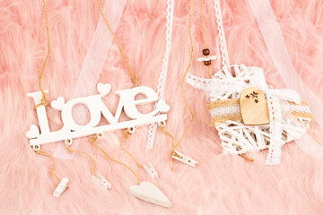 White wooden heart and word love