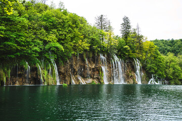 Plitvice Lakes beautiful nature, wood bridge. lakes, waterfall, rainbow, rivers.