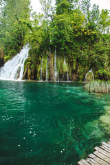 Plitvice Lakes beautiful nature, wood bridge. lakes, waterfall, rainbow, rivers.