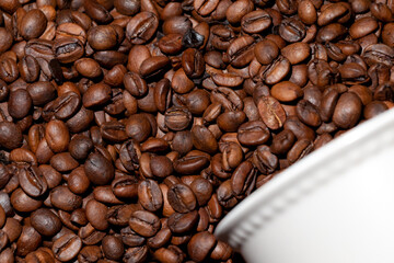 Coffee grains and partial cup background