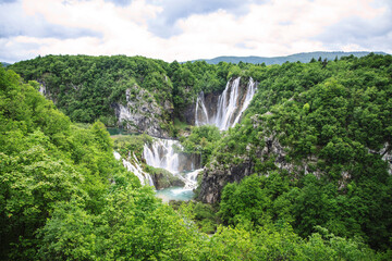 Plitvice Lakes beautiful nature, wood bridge. lakes, waterfall, rainbow, rivers.