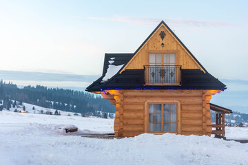 house in the mountains in winter