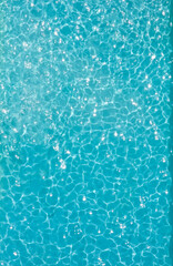 Fototapeta na wymiar Aerial view of a large crystal blue pool. A lot of negative space is in the image