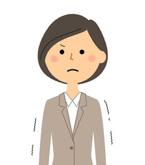 悔しがるスーツの女性