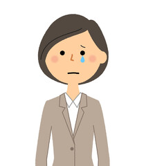 泣いているスーツの女性