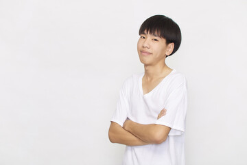 Young Asian male on white