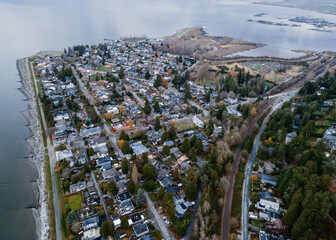 Aerial photograph of the community of Crescent Beach, British Columbia Canada on a moody fall day. 