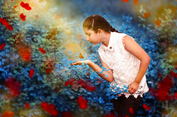 Girl catching butterfly outdoor in the nature