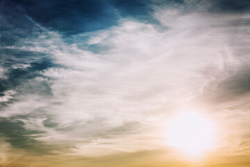 Dramatic blue sky with cirrus clouds on a sunny day. Background. Space for text.