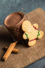Elegant cups with cinnamon gingerbread hot chocolate - hot chocolate served on the table