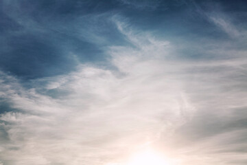 Obraz premium Dramatic blue sky with cirrus clouds on a sunny day. Background. Space for text.