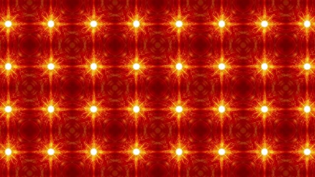Abstract orange yellow glowing stars matrix mosaic pattern light wall. 4K seamless looping imitation of LED RGB Videowall. LED star shapes animation video VJ loop background. Glowing Lamp Background.