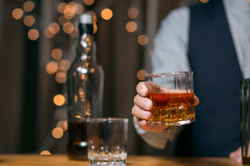 Barman pouring whiskey whiskey glass