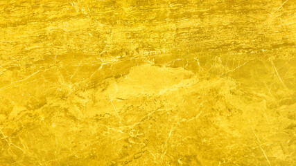 abstract illuminating yellow stone texture background. messy natural yellow background. color trend of 2021 year background.