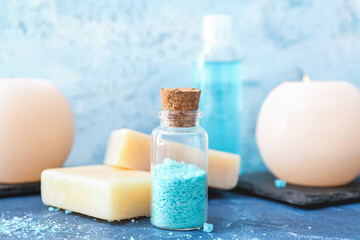 Spa composition with sea salt on color background
