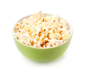 Bowl of tasty popcorn on white background
