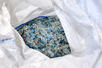 Multicolored shredded PET plastic.