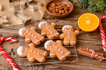 Christmas composition with gingerbread cookies on wooden background