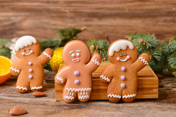 Christmas composition with gingerbread cookies on wooden background