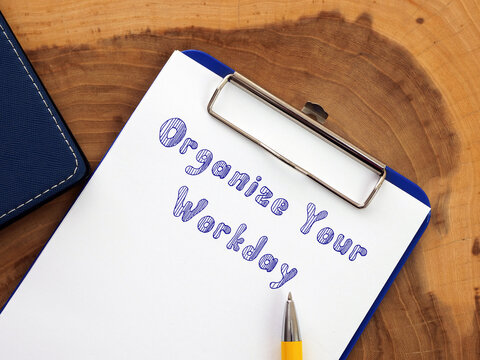 Lifestyle concept meaning Organize Your Workday with sign on the piece of paper.