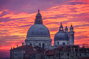 Fototapeta na wymiar Dome of Santa Maria della Salute cathedral at sunrise in Venice, Italy