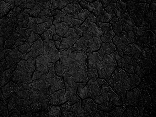 Black dark abstract pattern background. Black grunge texture. Old dry cracked rough oil paint wall surface.  Close-up. For disign. Empty space. Broken damaged weathered distressed.