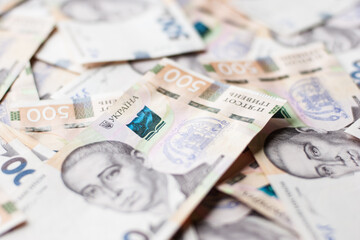 Obraz na płótnie Canvas Ukrainian paper money bills of hryvnias financial background. Savings or expence concept
