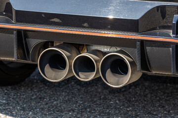 マフラー　Exhaust pipe of an automobile - obrazy, fototapety, plakaty