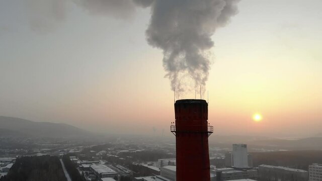 Factory pipe polluting air, environmental problems. Industrial factory pollution, smokestack exhaust gases. Climate change, ecology, atmoshere gas, ozone layer