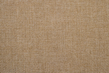 Full frame of linen canvas texture. Natural organic jute material. Beige woven fabric background