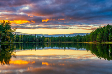 Beautiful sunset at the lake in autumn
