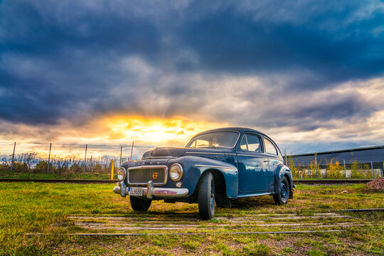 Vimmerby, Sweden - October 2020: Old vintage volvo car parked at the outskirts of Vimmerby city at sunset