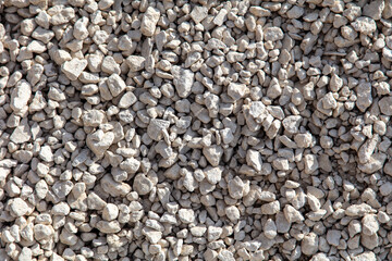 Stone gravel at a construction site as a background.