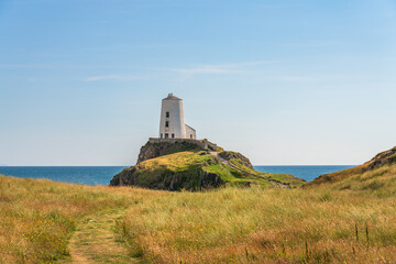 Fototapeta na wymiar Ty Mawr Lighthouse on Llanddwyn Island in North Wales
