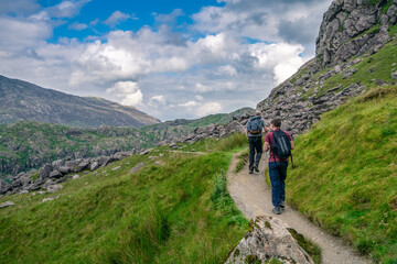 Fototapeta na wymiar Tourist hiking mountains in Snowdonia, North Wales 