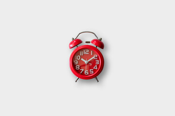 Fototapeta na wymiar Red alarm clock on white background.