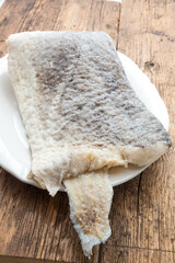 Slice of raw salted codfish