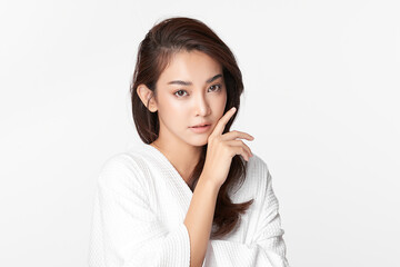 Beautiful Young asian Woman with Clean Fresh Skin, on Pink background, Face care, Facial treatment. Cosmetology, beauty and spa. Asian women portrait