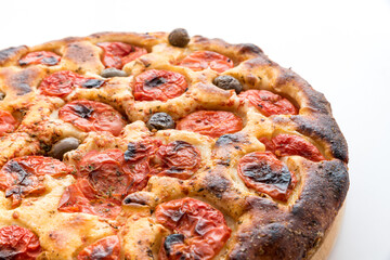Focaccia typical of Bari Italy with tomatoes and olive