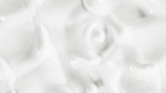 Super Slow Motion Shot of Swirling Fresh Milk at 1000fps.