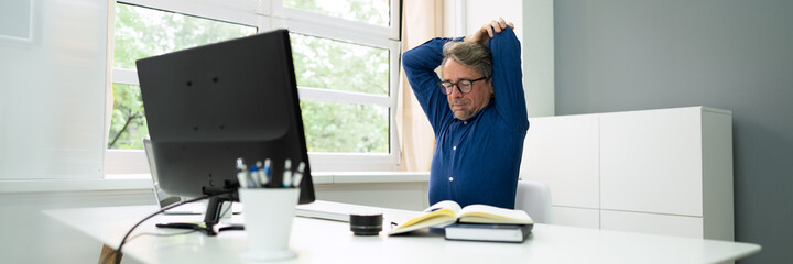 Stretching Exercise In Office Desk