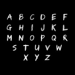 English alphabet. White hand drawn uppercase letters isolated on black background. Chalkboard lettering concept. Grunge font and signs. Stock vector illustration for style banners